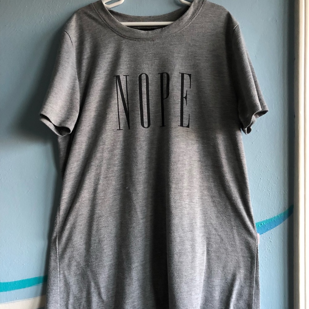 grey “NOPE” tee-shirt